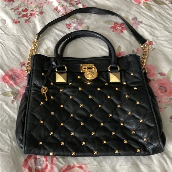 Michael Kors Handbags - Like new Michael Kors black with gold accents